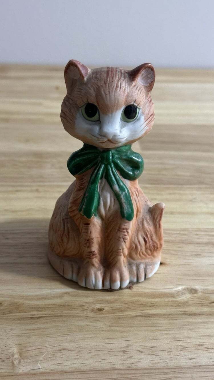 J.S.N.Y Vintage Porcelain Cat Bell Figurine with Green Bow Collectible